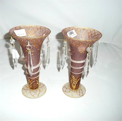 Lot 186 - A pair of glass overlay drop lustre vases