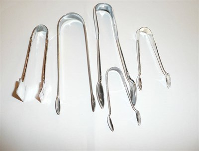 Lot 195 - Four pairs of silver nips and a pair of silver tongs