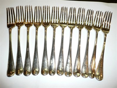 Lot 214 - Twelve table forks (12)