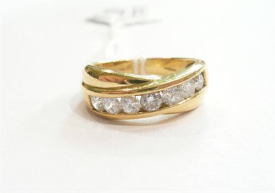 Lot 229 - An 18ct gold diamond half eternity ring