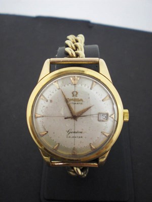 Lot 426 - An 18ct Gold Automatic Calendar Centre Seconds Wristwatch, signed Omega, Geneve, circa 1960,...