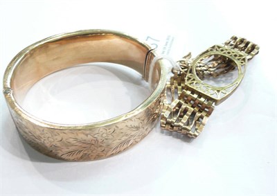 Lot 237 - 9ct gold bangle and gate bracelet (with fitting for sovereign)