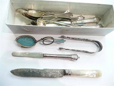 Lot 239 - Box of assorted silver, tongs, spoons, knives and enamel ware