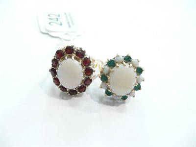 Lot 242 - An opal and garnet 9ct gold ring and another