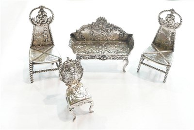 Lot 246 - Four silver miniature furniture pieces