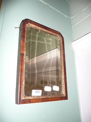 Lot 262 - A walnut-framed mirror