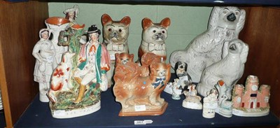 Lot 267 - Shelf of Staffordshire figures including flat back figures, spill vases, dogs, cats etc (a/f)