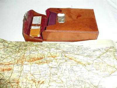 Lot 274 - Leather-cased motoring maps