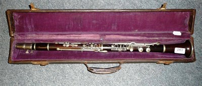 Lot 283 - A rosewood clarinet by R A Chaprell, London in a leather cloth case