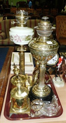 Lot 318 - Tray of assorted brassware including two oil lamp bases etc