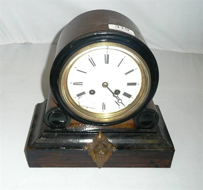 Lot 319 - Walnut and ebonised mantel clock