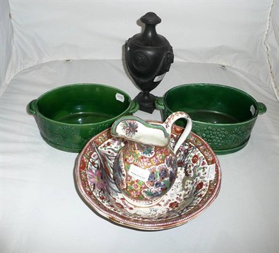 Lot 331 - Small washbasin and similar jug, two 19th century green glazed oval planters and a black basalt...