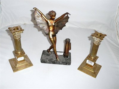 Lot 333 - Pair of brass Corinthian column candlesticks and a spelter figure of a butterfly girl