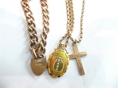 Lot 385 - A curb and lock bracelet, an engraved cross pendant on chain, a seed pearl set locket on fancy...