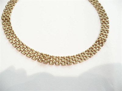 Lot 390 - 9ct gold collar necklace by Michael Phillips (boxed)