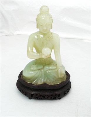 Lot 408 - A Chinese jadeite Buddha on stand