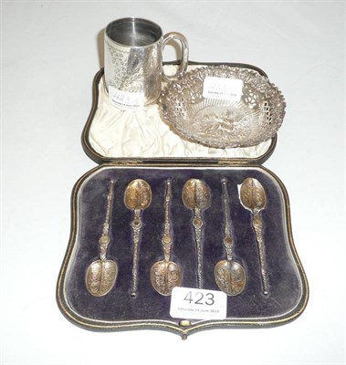 Lot 423 - Six silver gilt spoons and a silver mug; a silver relief-decorated and pierced small bowl