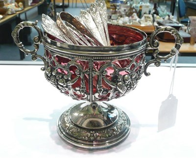 Lot 453 - Set of twelve silver tea spoons and tongs and a pierced sugar bowl with cranberry glass liner