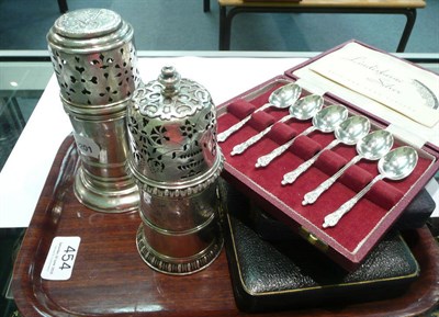 Lot 454 - Two silver casters and three cases of spoons