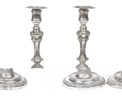 Lot 449 - A Pair of French Silver Candlesticks, maker's mark AL, Paris 1748, the nozzles 1747, the shaped...