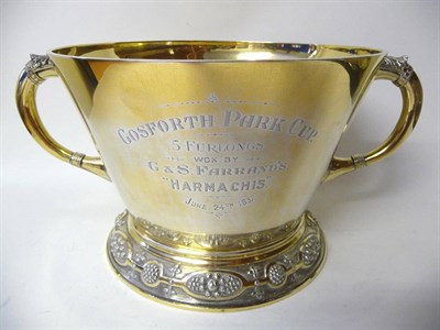 Lot 456 - A George VI Silver Gilt Cup, Reid & Sons of Newcastle, London 1937, the foliate chased foot...