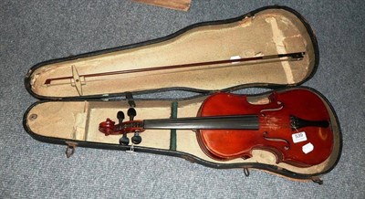 Lot 536 - A cased violin with bow