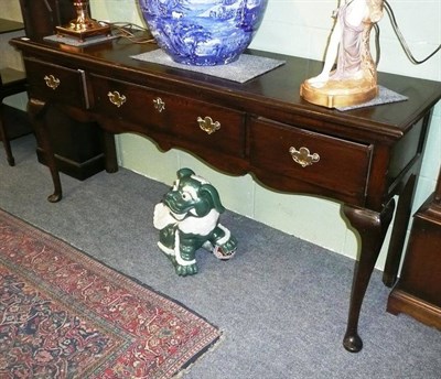 Lot 541 - George III Oak low dresser