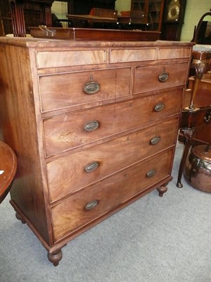 Lot 572 - A George III mahogany four height chest