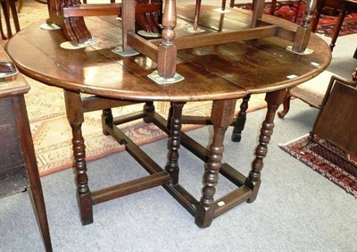 Lot 582 - A 17th/18th century gateleg dining table