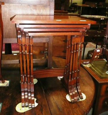 Lot 585 - Nest of four reproduction tables