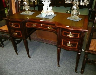 Lot 597 - Mahogany and satinwood banded writing table