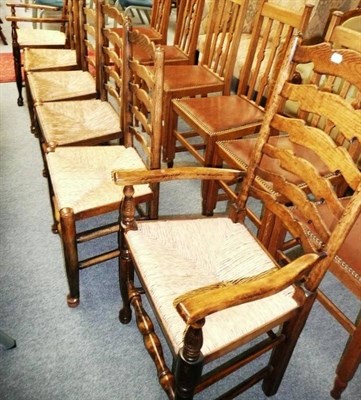 Lot 606 - Six Ash ladder-back chairs with rush seats