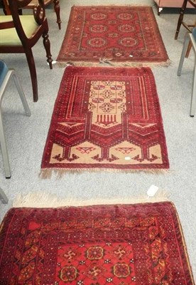 Lot 609 - Five Red Ground fringed Eastern rugs