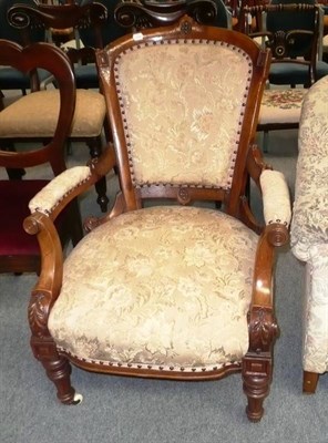 Lot 615 - Victorian walnut framed open arm chair