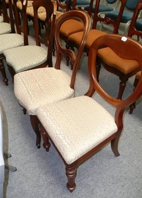 Lot 620 - Set of six Victorian walnut dining chairs and two balloon back dining chairs