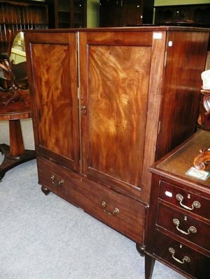 Lot 647 - Mahogany cupboard (three pieces missing from front)