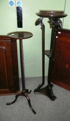 Lot 664 - A Carved Mahogany plant pedestal and a jardiniere stand on hoof feet