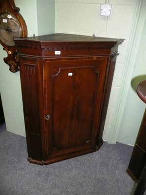 Lot 666 - Georgian mahogany hanging corner cupboard