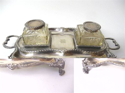 Lot 473 - A Victorian Inkstand, Sheffield 1899, of serpentine rectangular shape, gadrooned rim,...