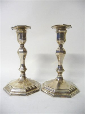 Lot 475 - A Pair of Victorian Candlesticks, Hawkesworth, Eyre & Co, Sheffield 1897/8, the octagonal bases...