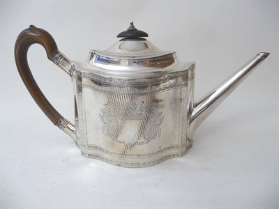 Lot 489 - A George III Teapot, Samuel Godbehere & Edward Wigan, London 1795, shaped oval with wood scroll...