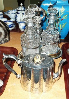 Lot 31 - An Old Sheffield Plate three bottle decanter holder with decanters, a plated teapot and a pair...