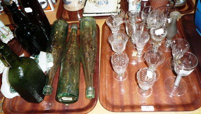 Lot 33 - An 18th century wine glass with latticino stem, a quantity of drinking glasses, six bottles and...