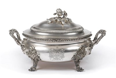 Lot 491 - A George III Soup Tureen, Cover and Liner, Robert Garrard, London 1819, oval, on four scroll...