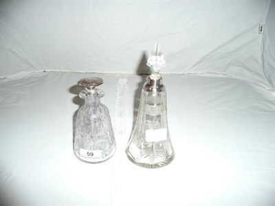 Lot 59 - Two scent bottles with silver mounts