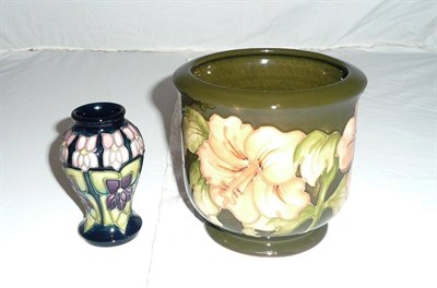 Lot 62 - A Walter Moorcroft "Coral Hibiscus" green ground planter and a modern Moorcroft miniature (2)