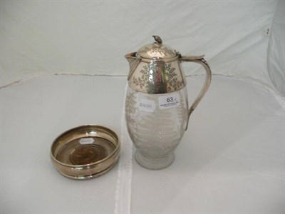 Lot 63 - Victorian silver-plated claret jug and a silver bottle coaster
