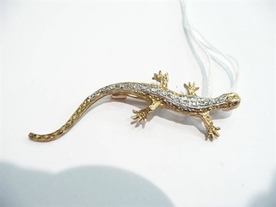 Lot 87 - A diamond-set lizard brooch