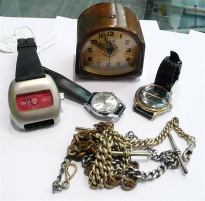 Lot 92 - An Art Deco travel alarm clock, two gentleman's wristwatches signed Grand Prix and Rodania,...