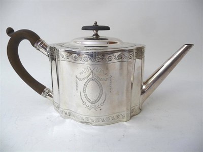 Lot 496 - A George III Teapot, William Vincent, London 1784, shaped oval with wood scroll handle, domed cover